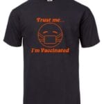 A black t-shirt with the words trust me i 'm vaccinated