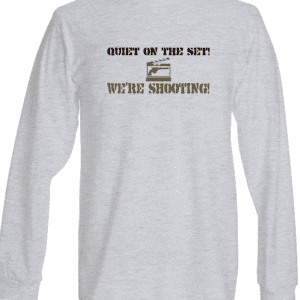 A long sleeve t-shirt with the words " quiet on the side we 're shooting ".