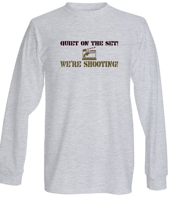 A long sleeve t-shirt with the words " quiet on the side we 're shooting ".