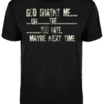 A black shirt with the words " god hates me, " and " maybe next time ".