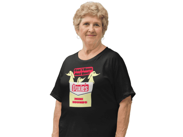 A woman wearing a black shirt with a picture of a bag of food.