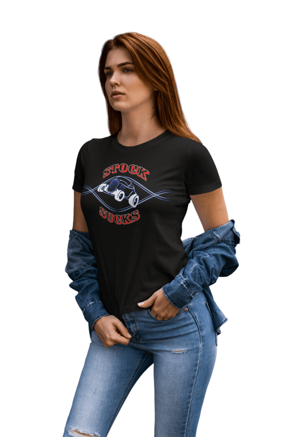 A woman wearing jeans and a t-shirt with an image of a car.
