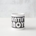 A white mug with the words " pentiy annoyer ".