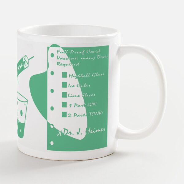 A coffee mug with a green and white design.