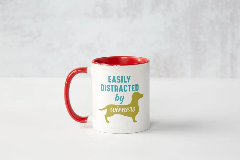 A coffee mug with the words " easly distracted by labrador retriever ".
