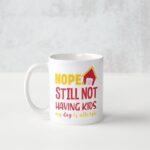 A white coffee mug with the words hope still not having kids.