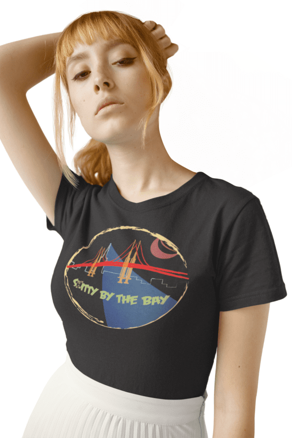 A woman wearing a black t-shirt with the city of the bay logo.