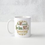 A white coffee mug with the words " i 'm just too old to be thou not douche ".