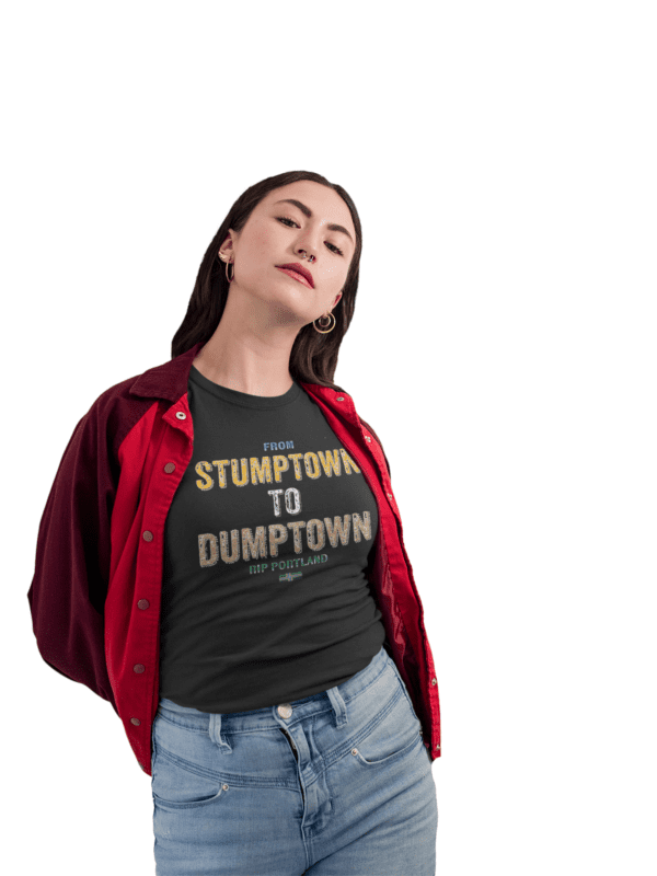 A woman in jeans and a t-shirt with the words " stumptown to dumptown ".