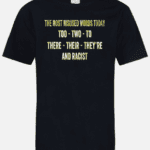 A black t-shirt with the words " racist " and " too two to there ".